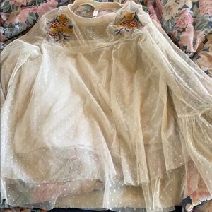 White lace blouse with stitched shoulders